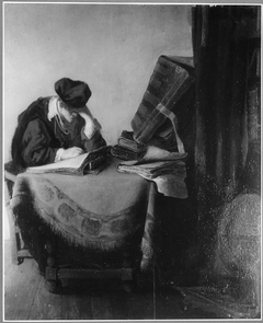 Young scholar reading in a study by Rembrandt